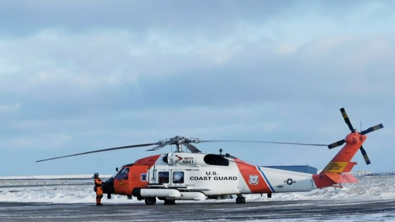 Helicopter gets ready to retrieve Todd Kochutin