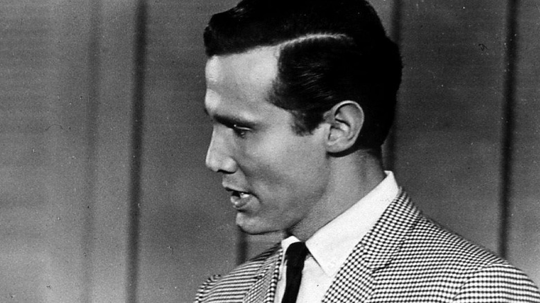 Henry Silva as Johnny Cool menacing