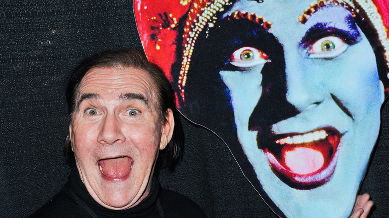 John Paragon posing with Jambi the Genie