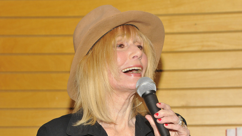 Sally Kellerman singing microphone hat