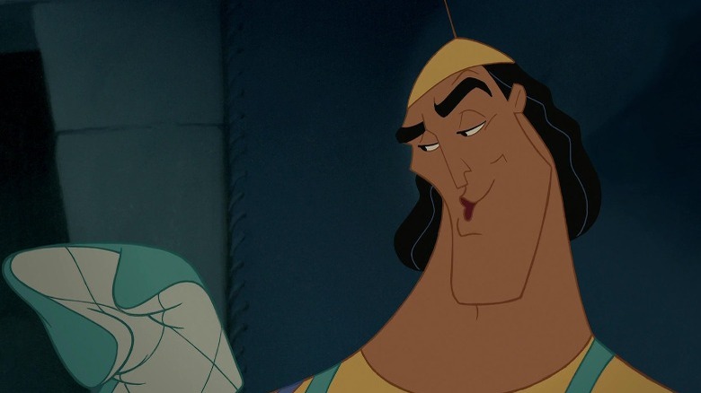 Kronk wearing oven mitts