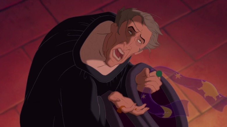 Frollo clutching Esmeralda's scarf