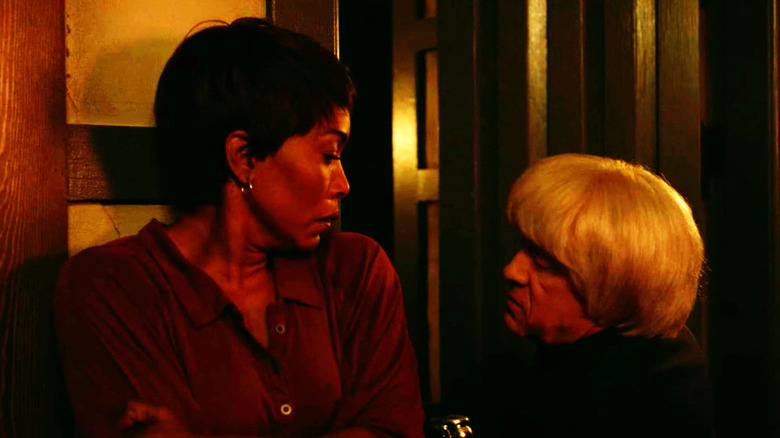 Angela Bassett as Lee Harris with Cricket Marlowe