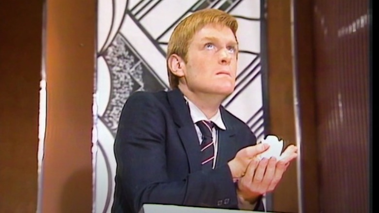 Vislor Turlough thinking Doctor Who