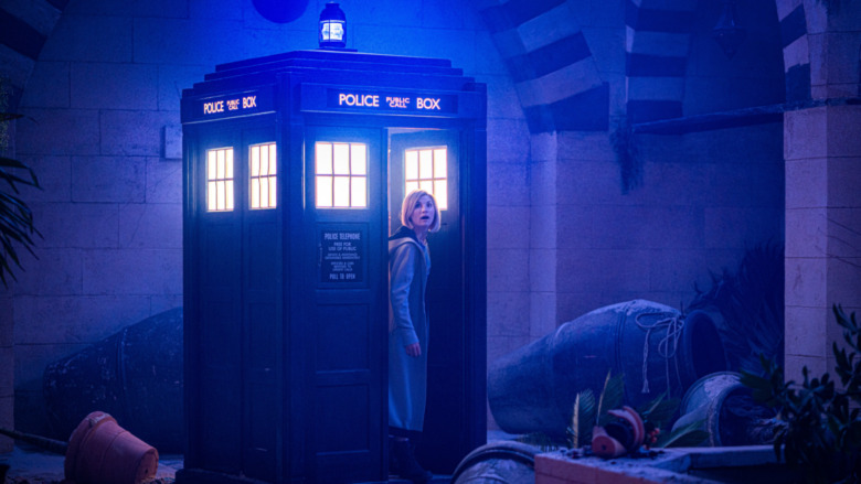 The Doctor exits the TARDIS