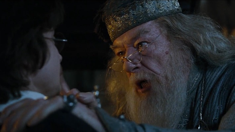 Dumbledore manhandles Harry