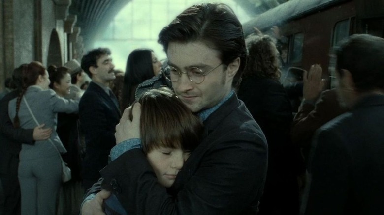 Harry hugs Albus Severus