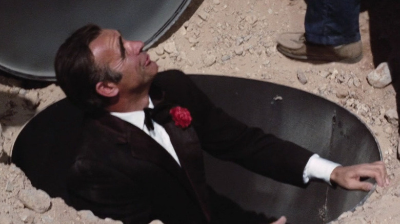 James Bond (Sean Connery) emerges from the pipeline in "Diamonds Are Forever"