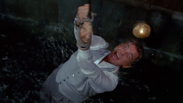 Felix Leiter (David Hedison) is held above a shark tank in "Licence to Kill"