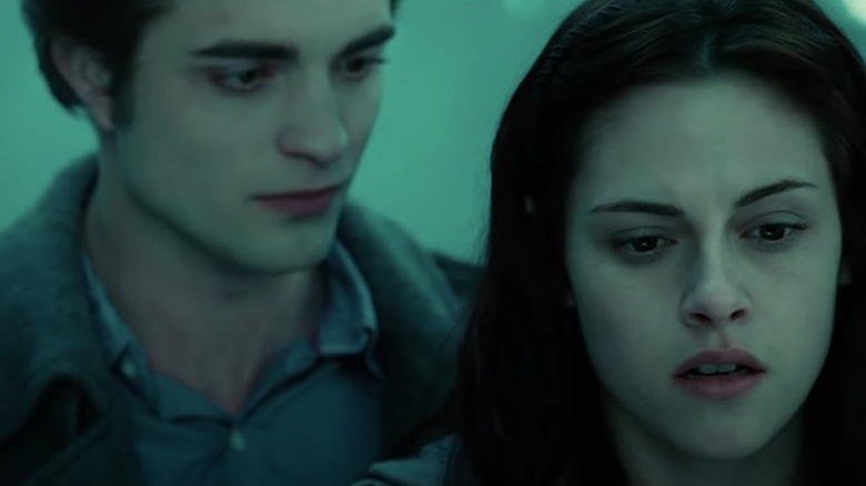 Edward looks at Bella from behind