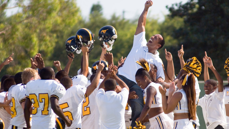 Dwayne Johnson and his football team