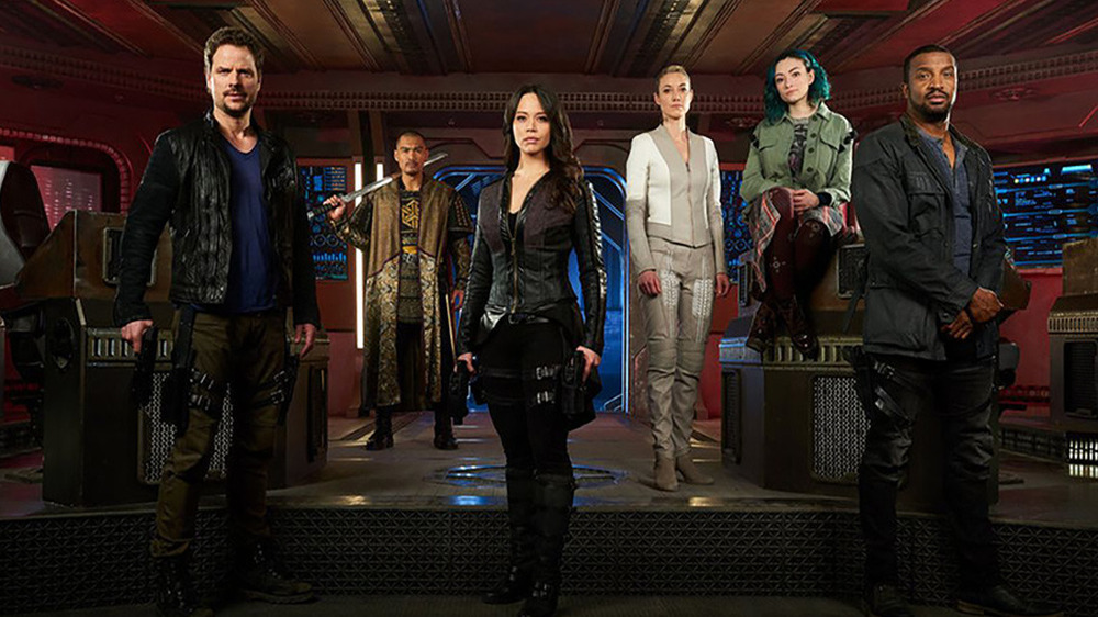 The main cast of Dark Matter posing for the camera 