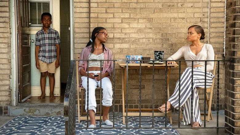 Ebony and kids on porch