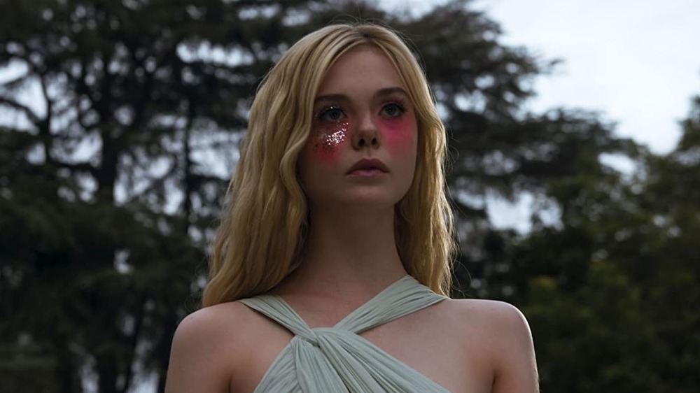 Elle Fanning wears glitter makeup