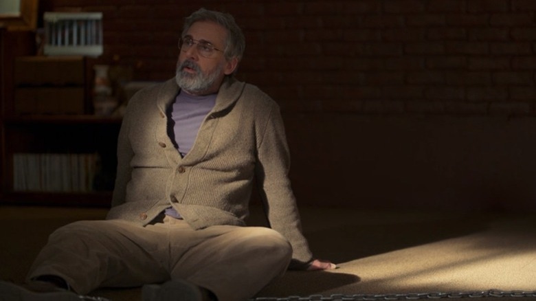 Steve Carell sits in the sunlight in The Patient