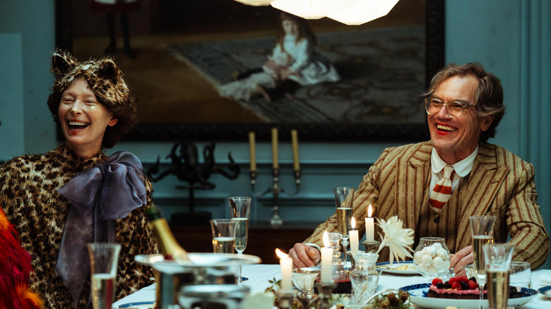 Mother and Father laugh at dinner table