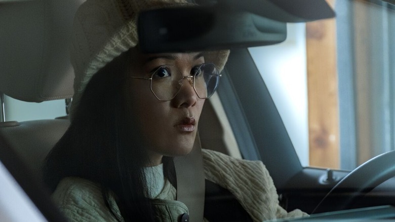 Ali Wong looking out car window