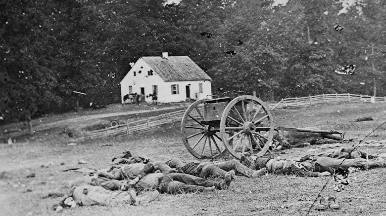 Soldiers lie dead in front of the Dunker Church after the Battle of Antietam