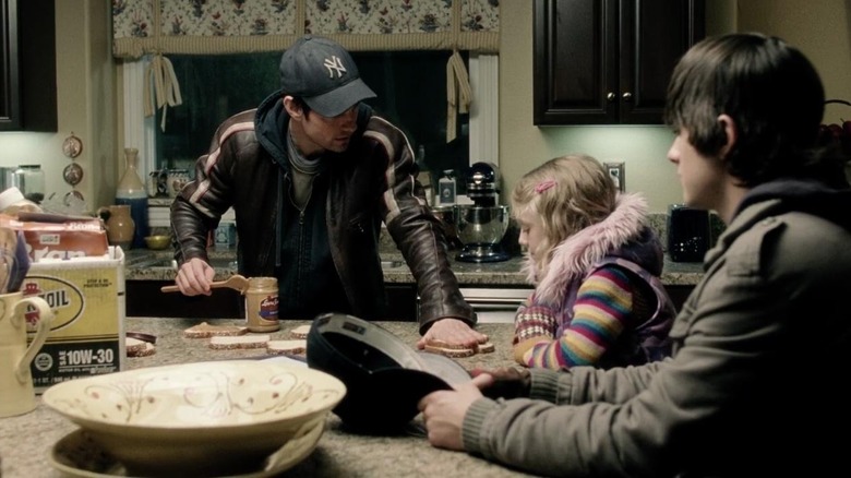 Ray with kids in kitchen