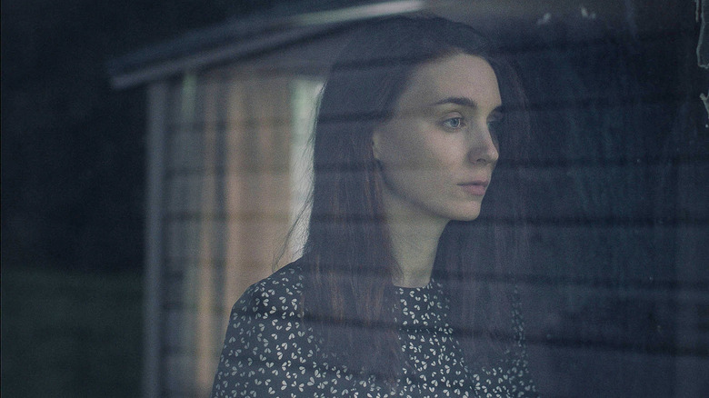 Rooney Mara looking out a window A Ghost Story