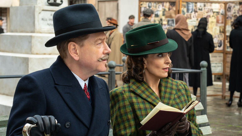 Poirot sits with Ariadne Oliver