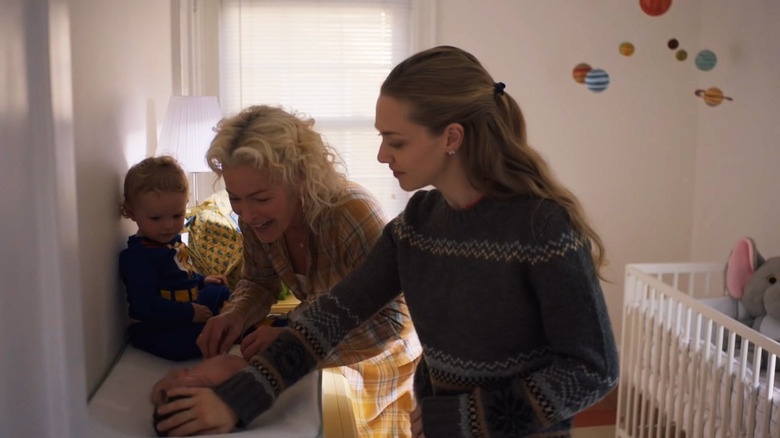 Julie and her mother admiring Rachel