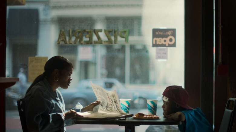 Inez and Terry sit at a restaurant