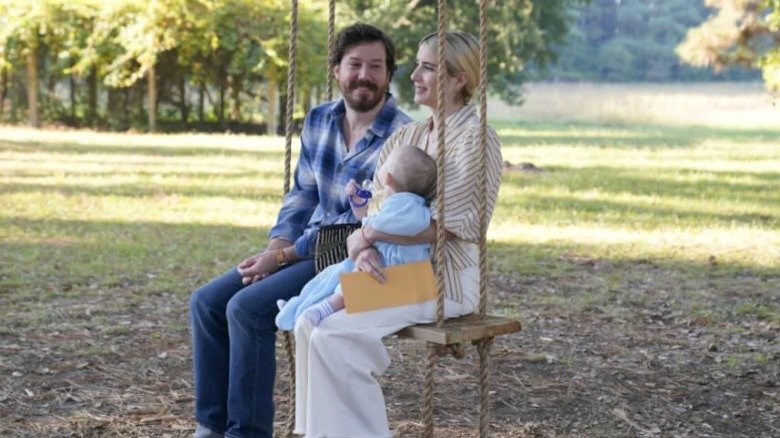 Alex, Liam , and Sara on a swing