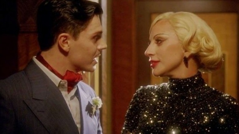 Evan Peters and Lady Gaga dressed up in AHS Hotel