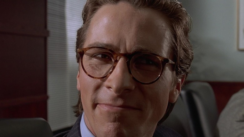 Patrick Bateman wearing glasses