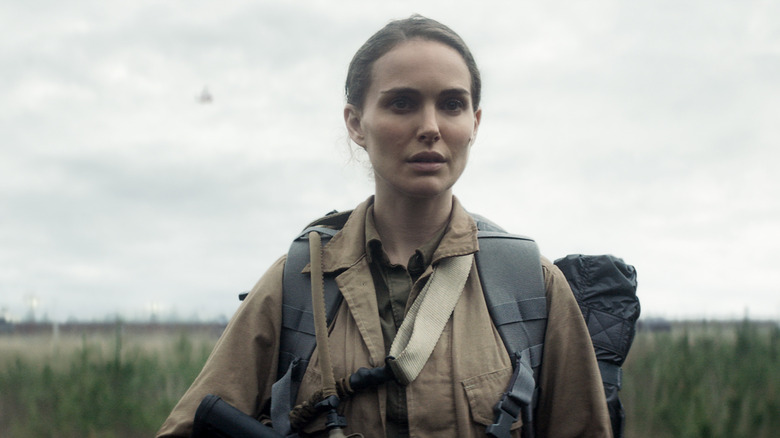 Lena stands in field