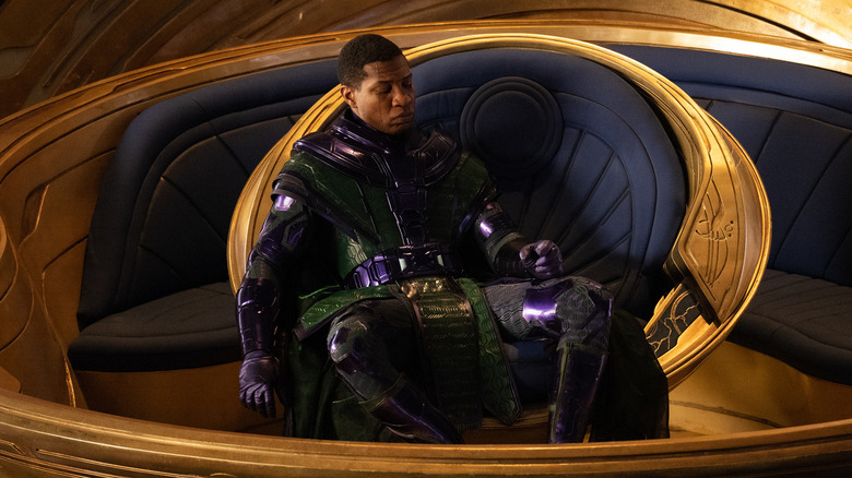 kang sits in his throne