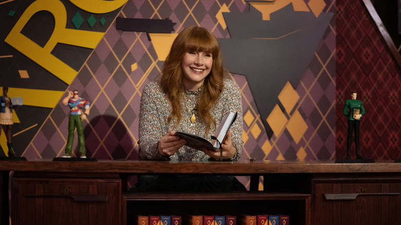 Elly holding her book