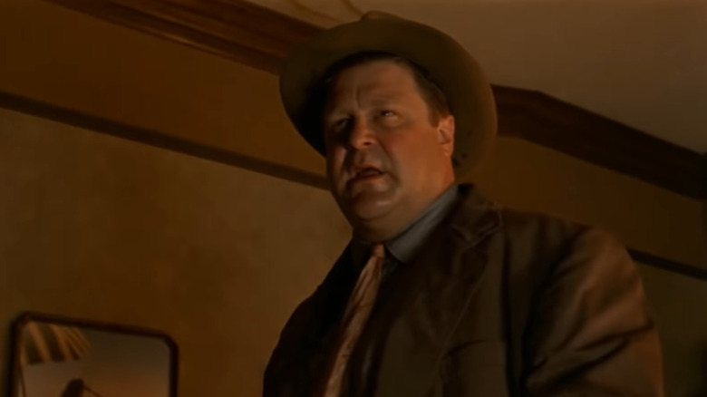 John Goodman standing 