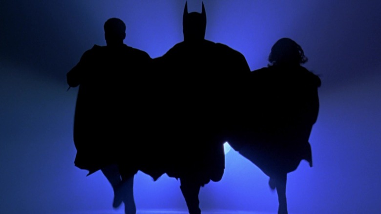 Robin, Batman and Batgirl silhouette