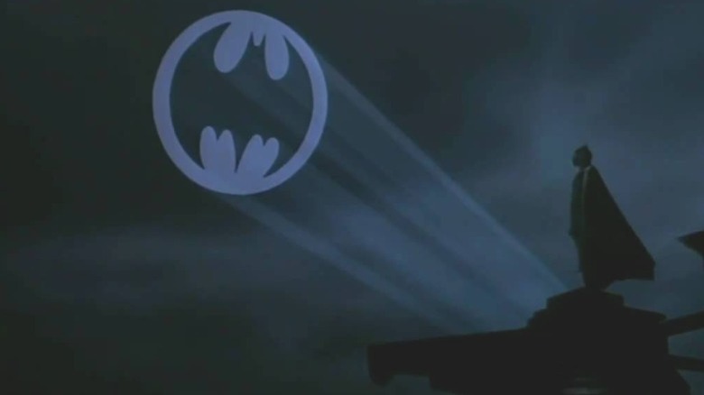 Batman looks at bat signal