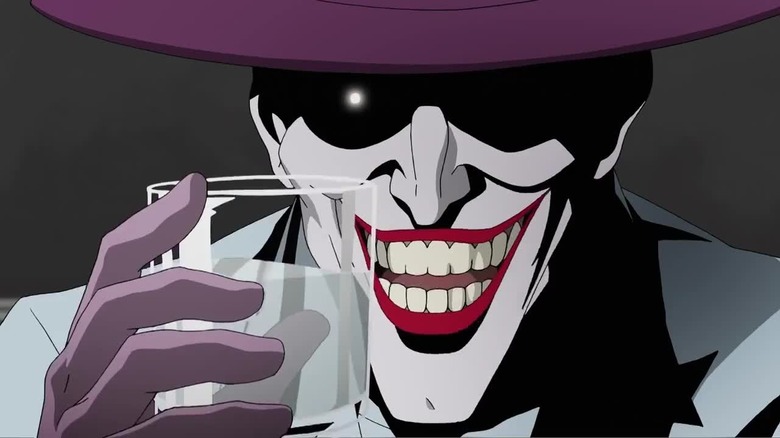 Joker holding a glass