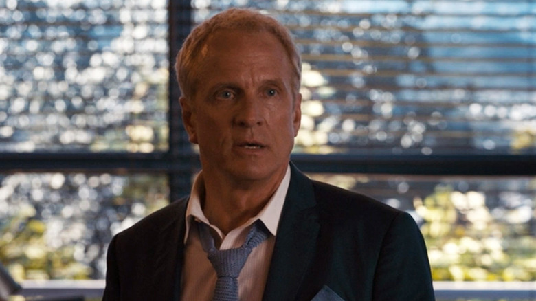 Patrick Fabian Howard Hamlin tie pulled down