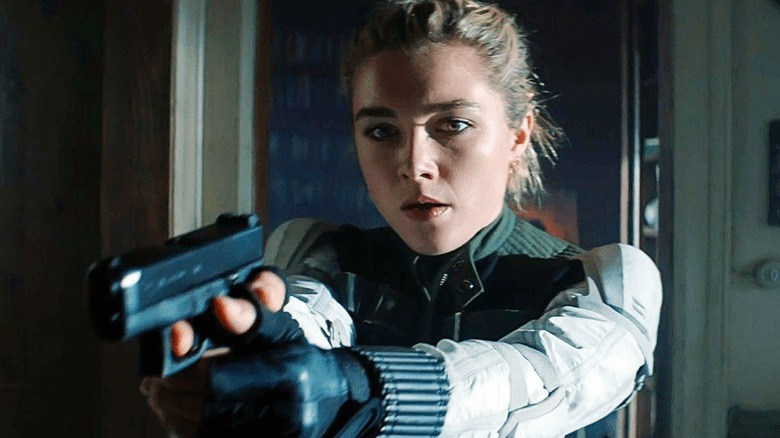 Yelena Belova holding gun