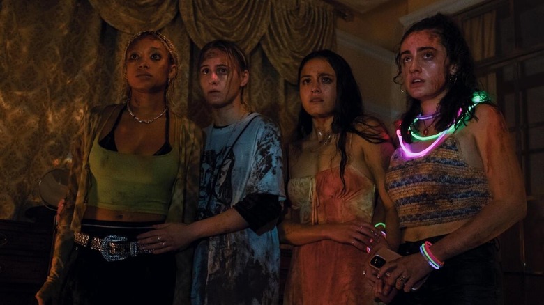 Amandla Stenberg, Maria Bakalova, Chase Sui Wonders, and Rachel Sennott cowering and covered in blood