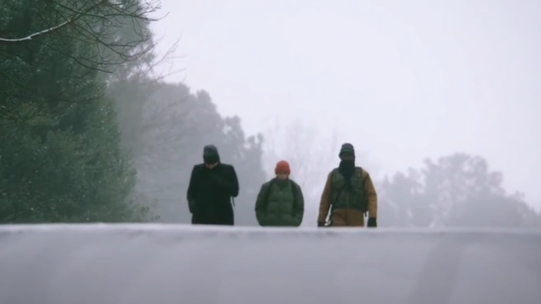 Clay, Jordan, and Tom walking in the snow