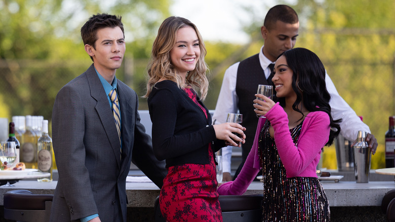 Luke, Megan, and Isabella at party