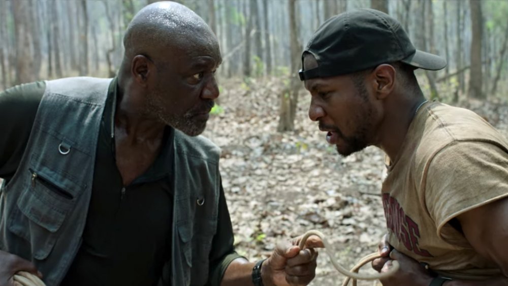 Delroy Lindo as Paul and Jonathan Majors as David in Da 5 Bloods