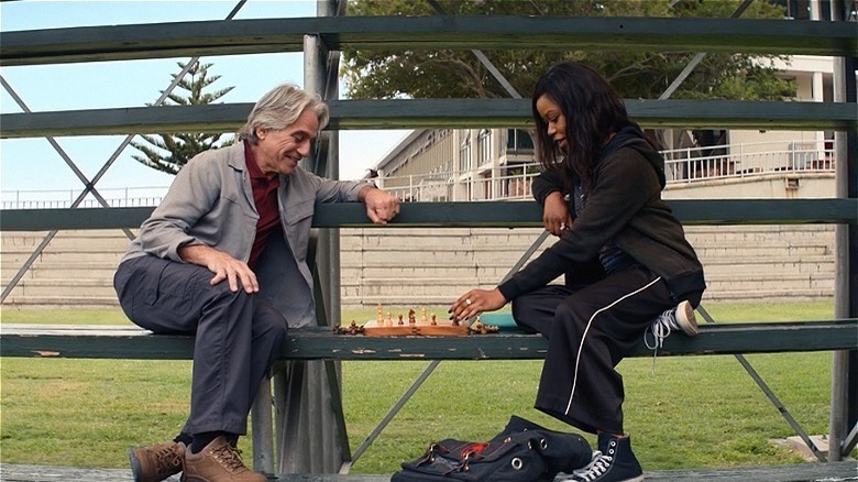 Darby playing chess with ghost Gary