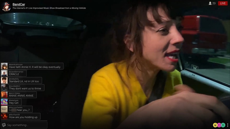 Annie drives while comments fill the screen