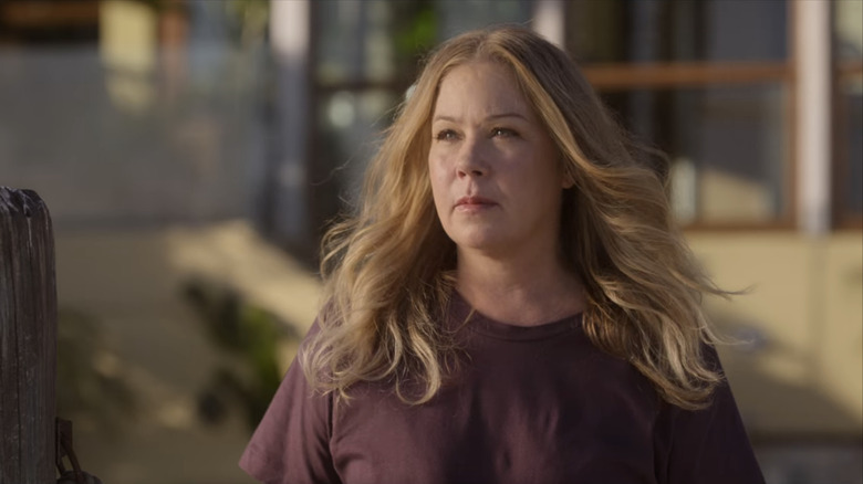 Christina Applegate looks reflective in "Dead to Me"