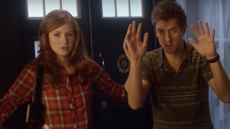 Amy and Rory surrendering