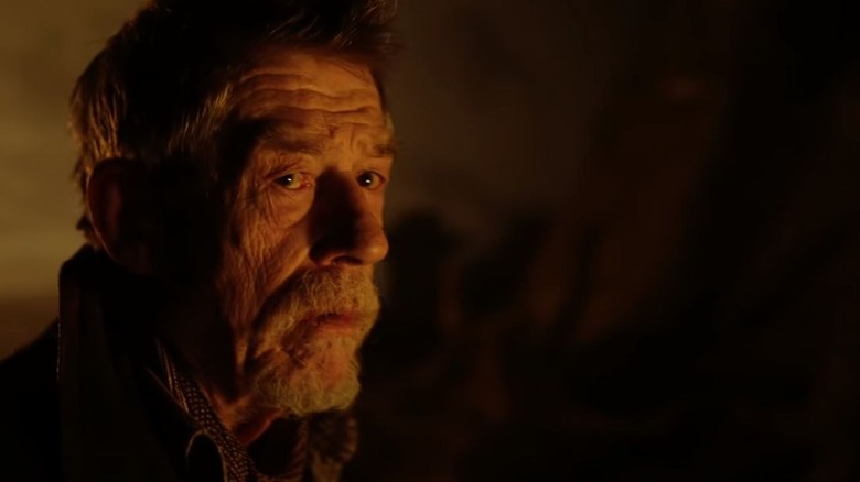 The War Doctor looking mournful