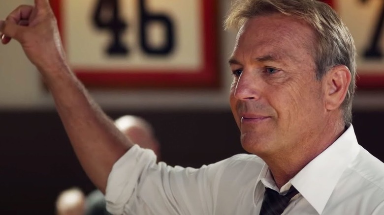 Kevin Costner smiling in Draft Day