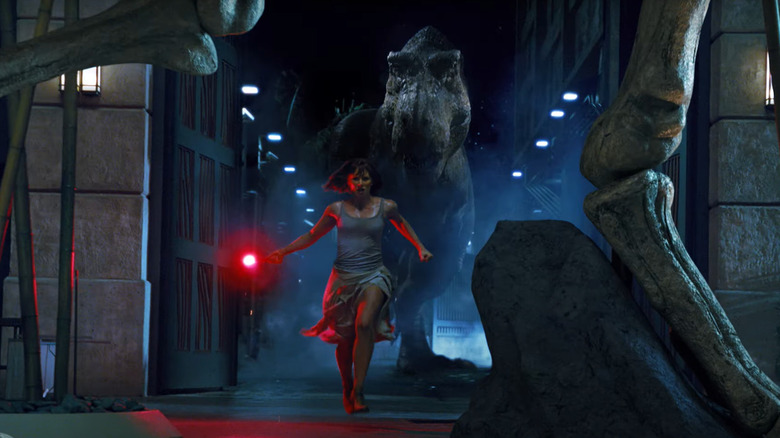 Claire running from t-rex